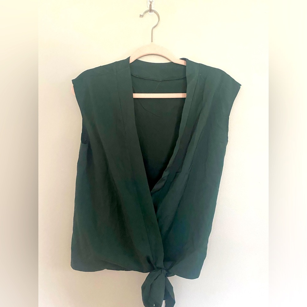 Green faux wrap blouse.